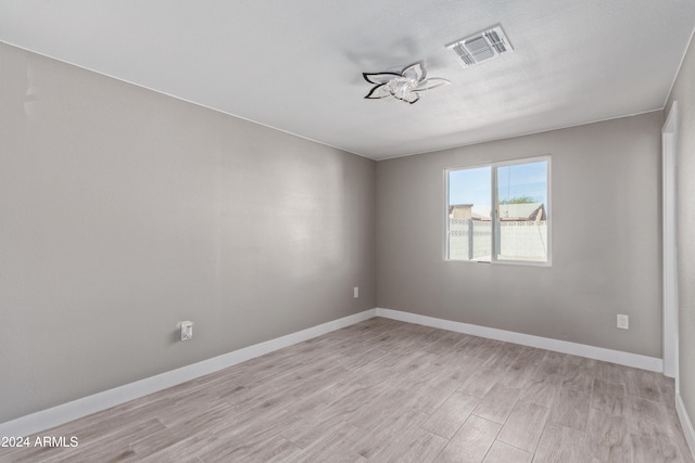 empty room featuring light hardwood / wood-style floors