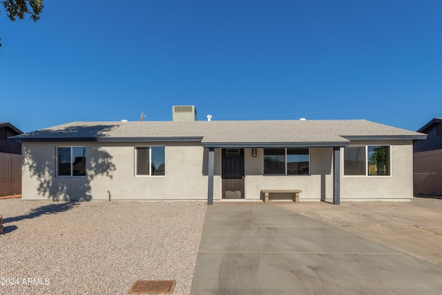 single story home with a patio