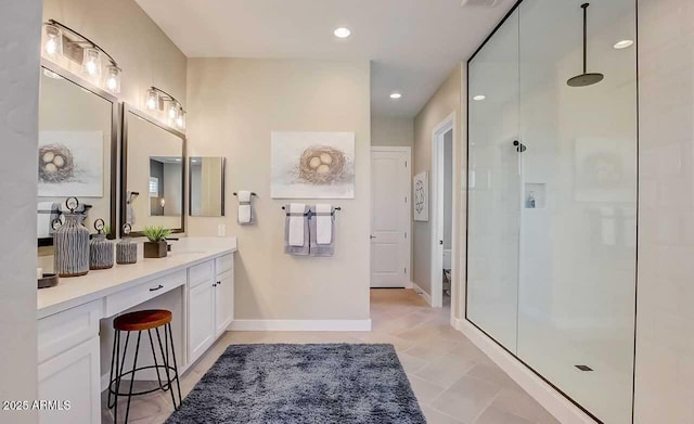 16342 W Jackson St, Goodyear, AZ 85338 - full bath with a shower stall, vanity, and recessed lighting