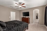 bedroom featuring light colored carpet and ceiling fan