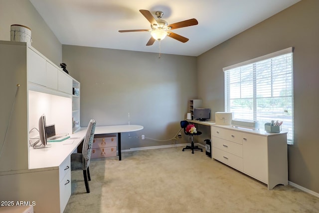 office area featuring light colored carpet and ceiling fan