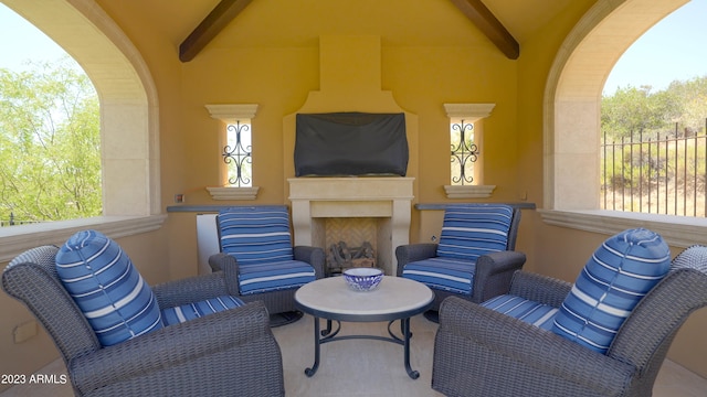 view of patio with an outdoor fireplace