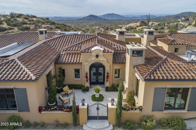 view of front facade with a mountain view