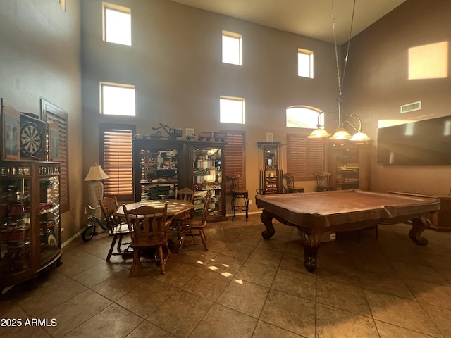 game room with pool table and tile patterned floors