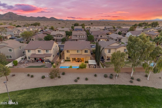 aerial view with a mountain view and a residential view