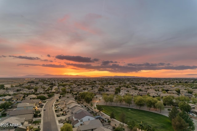 birds eye view of property with a residential view and a mountain view