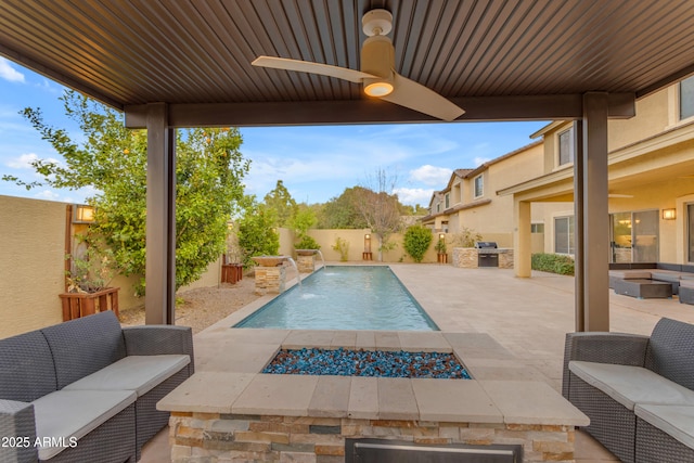 view of pool featuring a fenced in pool, a patio, area for grilling, an outdoor living space with a fire pit, and a fenced backyard