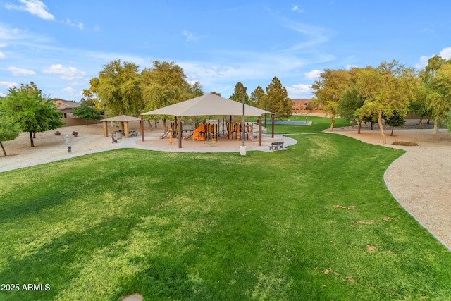 surrounding community featuring a gazebo, playground community, and a lawn