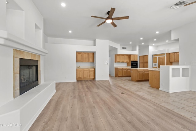 31234 N 47th Pl, Cave Creek, AZ 85331 - unfurnished living room featuring recessed lighting, ceiling fan, a fireplace, and light wood finished floors
