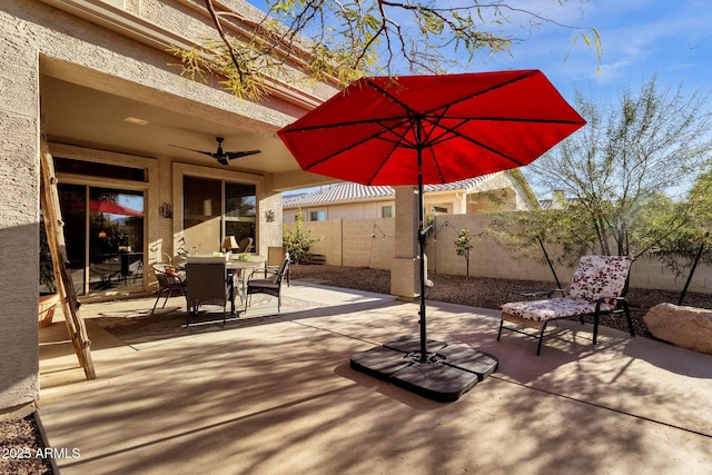 view of patio / terrace featuring ceiling fan