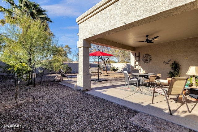 view of patio / terrace featuring ceiling fan