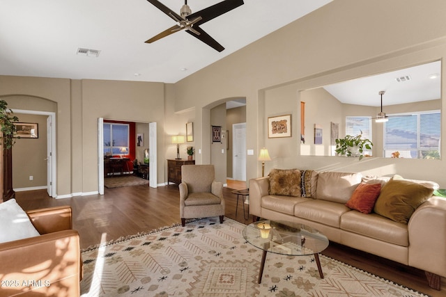 living room featuring ceiling fan and wood-type flooring