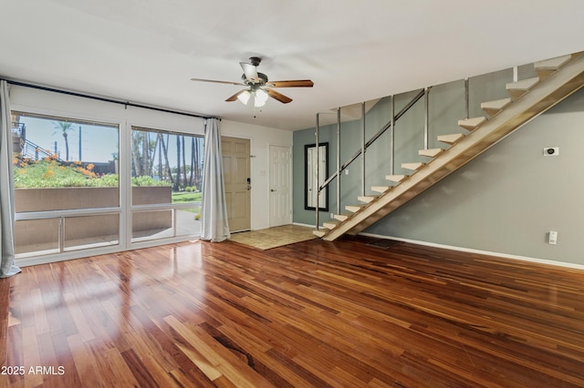 interior space featuring ceiling fan and wood-type flooring