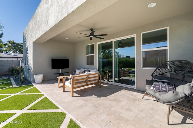 view of patio / terrace featuring ceiling fan and an outdoor hangout area