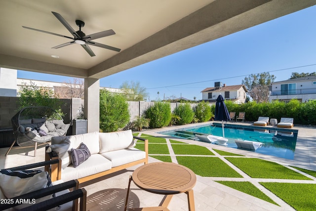 view of pool with ceiling fan, an outdoor hangout area, and a patio