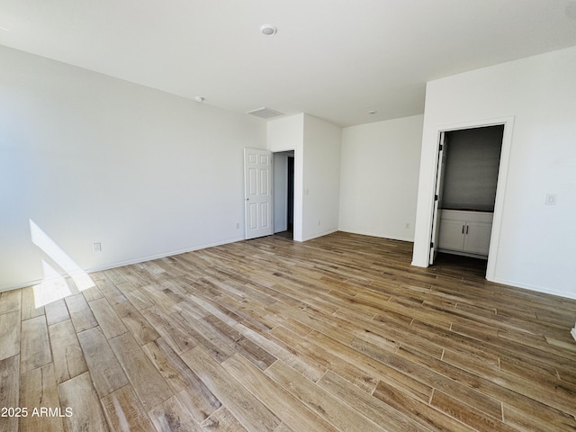 46904 W Coe St, Maricopa, AZ 85139 - empty room with wood finished floors