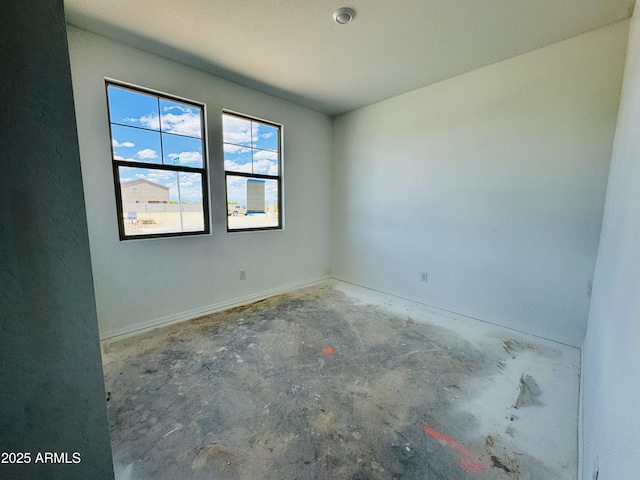 46904 W Coe St, Maricopa, AZ 85139 - unfurnished room featuring concrete floors and baseboards