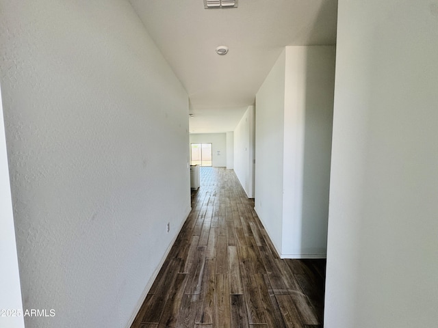 46904 W Coe St, Maricopa, AZ 85139 - hall with dark wood finished floors and baseboards