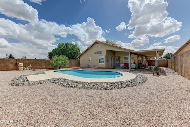5674 W N Ln, Glendale, AZ 85302 - view of swimming pool with a fenced in pool, a patio area, and a fenced backyard
