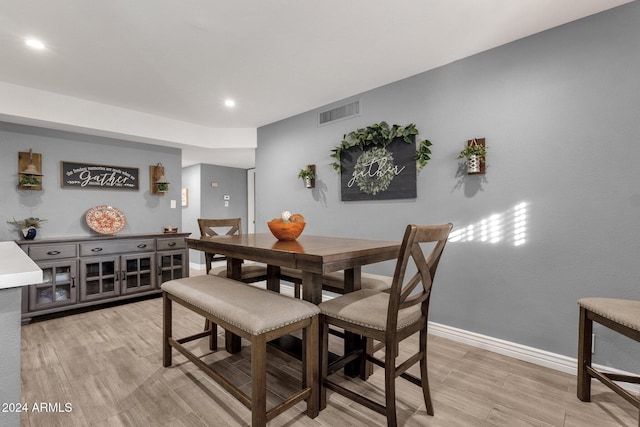 dining room with light wood-type flooring