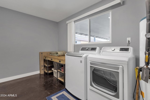 clothes washing area featuring independent washer and dryer