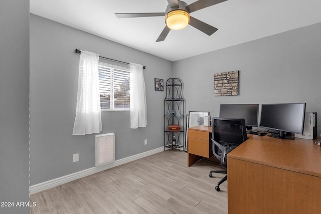 office featuring ceiling fan and light hardwood / wood-style floors