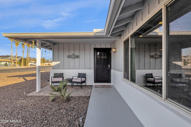 doorway to property with a patio