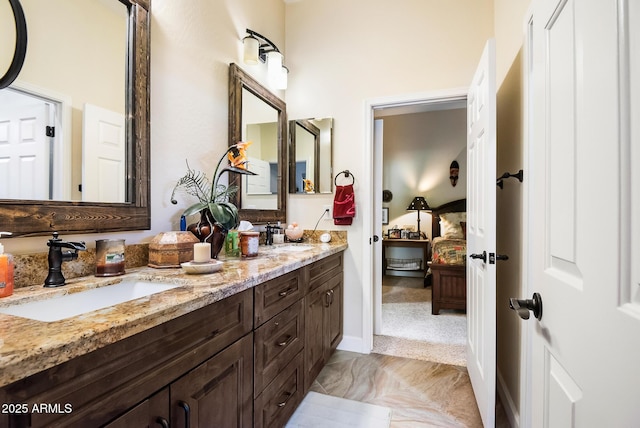 bathroom featuring tile patterned floors and vanity