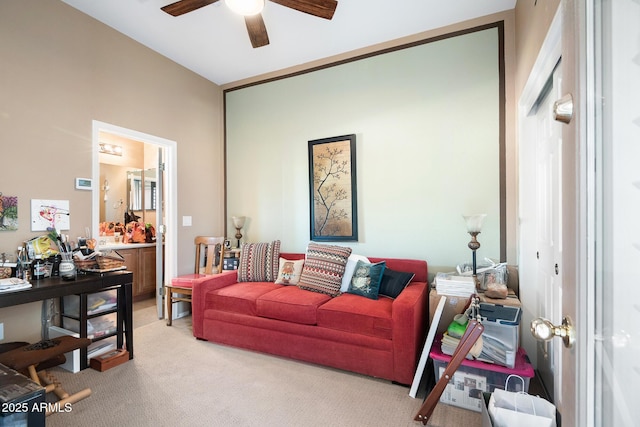 living room with light colored carpet and ceiling fan