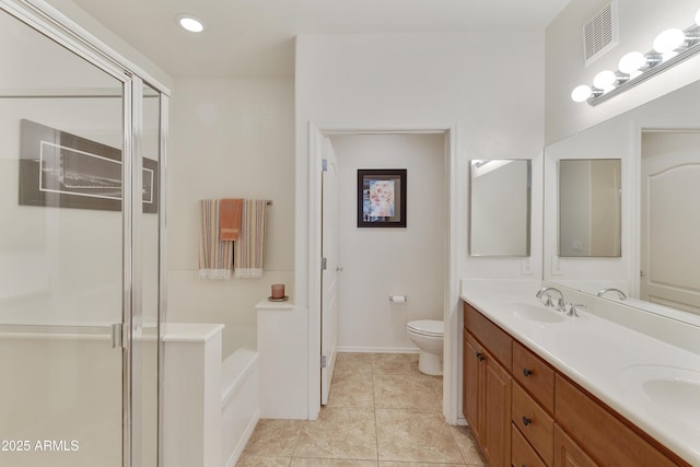 full bathroom featuring vanity, toilet, tile patterned flooring, and plus walk in shower