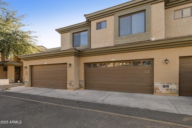 view of front of property with a garage