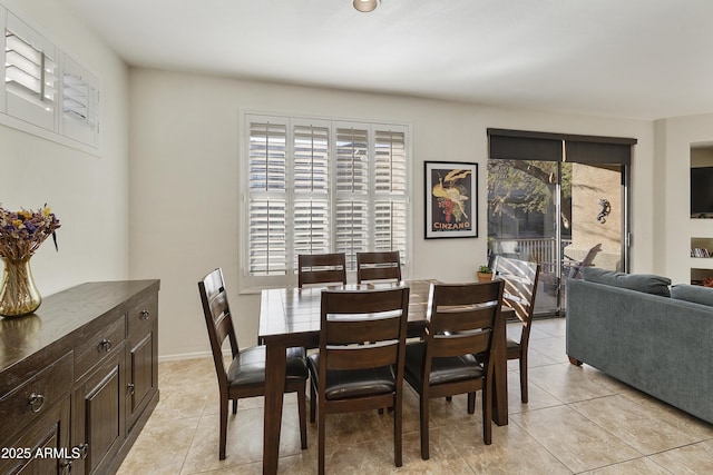 dining room featuring light tile patterned floors