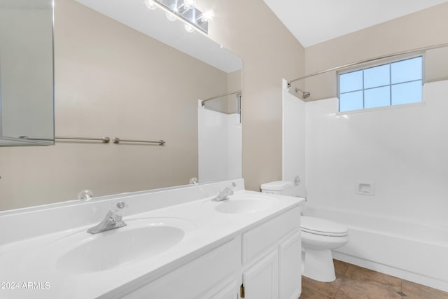 full bathroom with tile patterned flooring, vanity, bathing tub / shower combination, and toilet