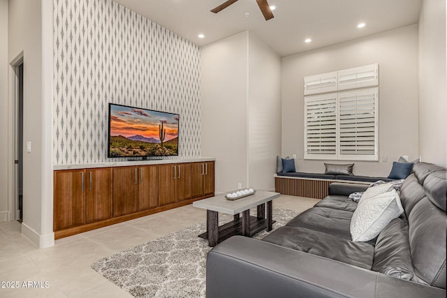 tiled living room with ceiling fan