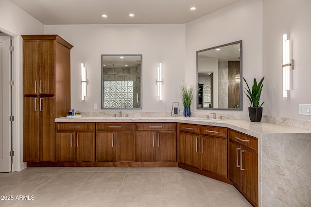 bathroom with vanity, tile patterned floors, and walk in shower