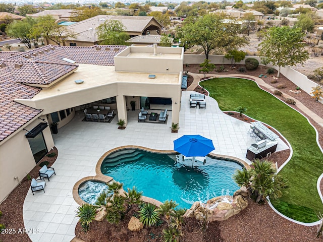 view of swimming pool with a patio and an outdoor hangout area