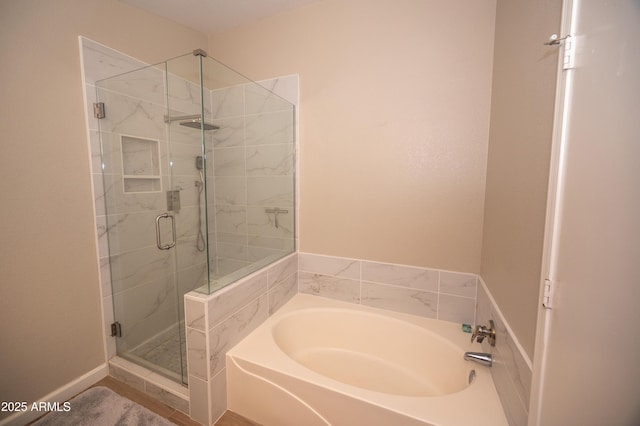 bathroom featuring plus walk in shower