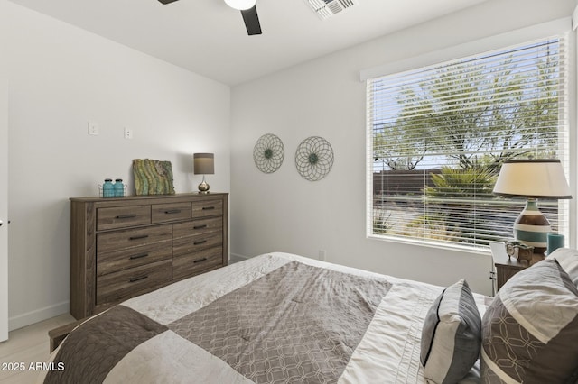 13204 W Via Dona Rd, Peoria, AZ 85383 - bedroom with a ceiling fan, baseboards, and visible vents