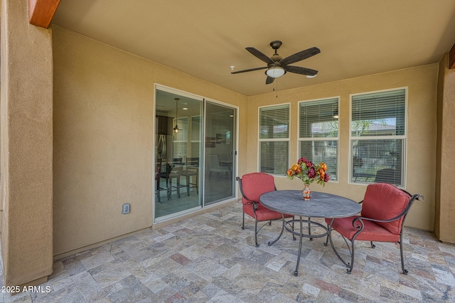 13204 W Via Dona Rd, Peoria, AZ 85383 - view of patio featuring outdoor dining space and a ceiling fan