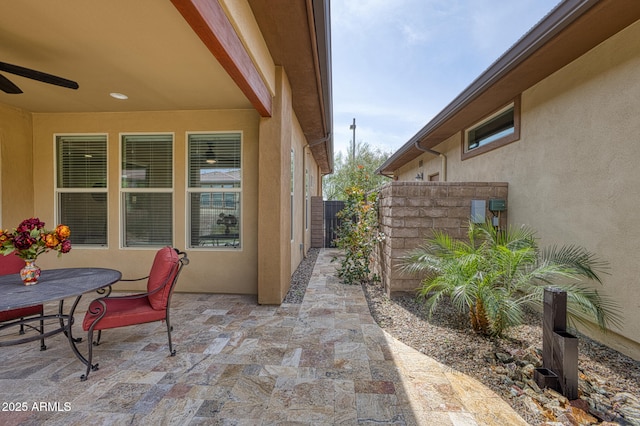 13204 W Via Dona Rd, Peoria, AZ 85383 - view of patio with a ceiling fan, fence, and outdoor dining space