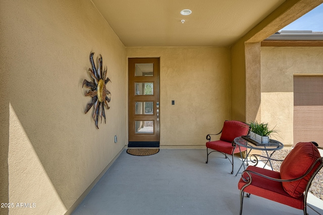 13204 W Via Dona Rd, Peoria, AZ 85383 - property entrance with stucco siding and a porch