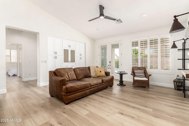 18614 E Oriole Way, Queen Creek, AZ 85142 - living area with a ceiling fan, light wood finished floors, lofted ceiling, french doors, and baseboards