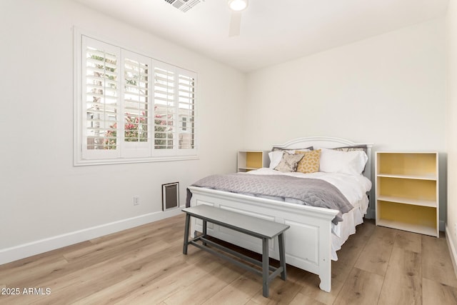 18614 E Oriole Way, Queen Creek, AZ 85142 - bedroom with light wood finished floors, baseboards, and a ceiling fan