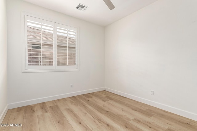 18614 E Oriole Way, Queen Creek, AZ 85142 - spare room featuring wood finished floors, baseboards, and a ceiling fan