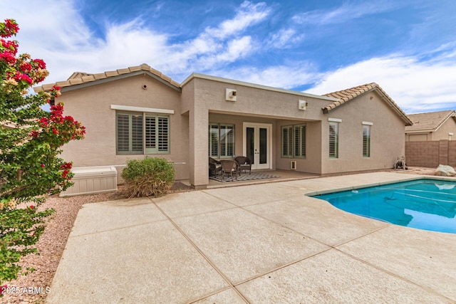 18614 E Oriole Way, Queen Creek, AZ 85142 - rear view of house with french doors, a patio area, stucco siding, and a tile roof
