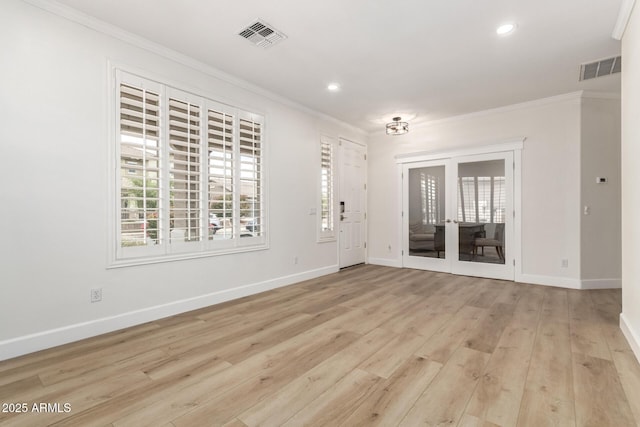 18614 E Oriole Way, Queen Creek, AZ 85142 - empty room with crown molding, light wood-style floors, recessed lighting, baseboards, and french doors
