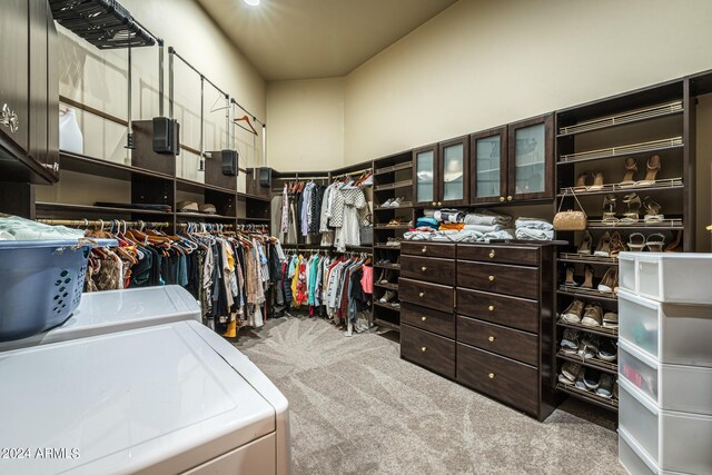 bedroom featuring light hardwood / wood-style floors, a high end fireplace, and ceiling fan