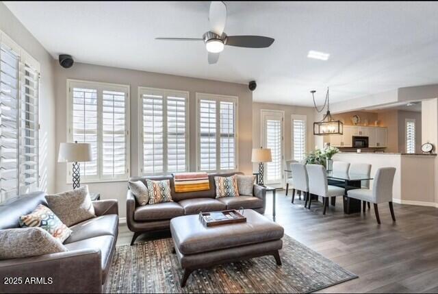 15221 N Clubgate Dr Unit 2096, Scottsdale, AZ 85254 - living room featuring wood finished floors and a ceiling fan