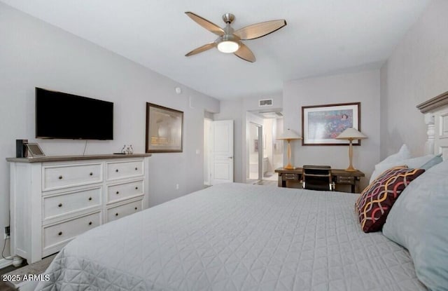 15221 N Clubgate Dr Unit 2096, Scottsdale, AZ 85254 - bedroom with a ceiling fan and connected bathroom