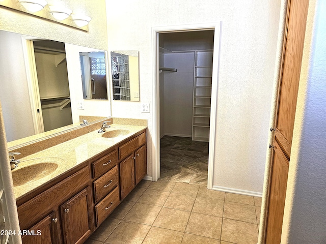 bathroom with vanity and tile patterned floors